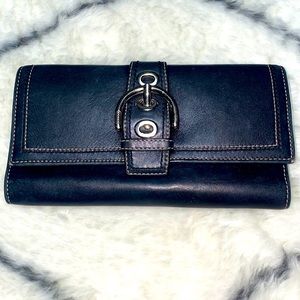 COACH trifold wallet. Black leather! Still looks great! Minimal ware.